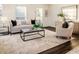 Living room with hardwood floors, neutral decor, and ample natural light at 4618 Crestview Ln, Lakeland, FL 33813