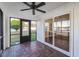 Relaxing screened porch with brick flooring and access to backyard at 4618 Crestview Ln, Lakeland, FL 33813