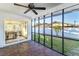 Spacious screened porch with brick tile floor and ceiling fan at 4618 Crestview Ln, Lakeland, FL 33813