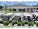 Golf cart storage area with numerous carts parked neatly at 6205 Raven Run, Lakeland, FL 33809