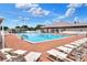 Relaxing community pool with plenty of lounge chairs at 6205 Raven Run, Lakeland, FL 33809
