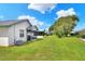 Large backyard with multiple homes visible at 6205 Raven Run, Lakeland, FL 33809