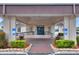 Accessible clubhouse entrance with landscaping at 6205 Raven Run, Lakeland, FL 33809