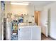 Bright laundry room with washer, dryer, and ample storage at 6205 Raven Run, Lakeland, FL 33809