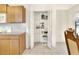 Walk-in pantry with shelving, offering extra kitchen storage at 6205 Raven Run, Lakeland, FL 33809