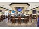 Large bar and restaurant with multiple screens and seating at 6205 Raven Run, Lakeland, FL 33809