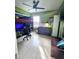 Spacious bedroom with a built-in bunk bed, desk and a fish tank at 1109 Brenton Manor Dr, Winter Haven, FL 33881
