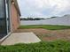 Fenced backyard with a patio and gravel area at 1109 Brenton Manor Dr, Winter Haven, FL 33881