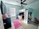 Bright bedroom with built-in bunk bed, desk, and ample storage at 1109 Brenton Manor Dr, Winter Haven, FL 33881