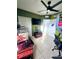 Bedroom with a bunk bed, desk, and a ceiling fan at 1109 Brenton Manor Dr, Winter Haven, FL 33881