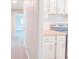 Modern kitchen with white cabinets and wood countertops at 121 Coleman Rd, Winter Haven, FL 33880
