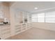 Built-in shelving in dining area, open to kitchen at 121 Coleman Rd, Winter Haven, FL 33880