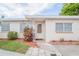 House exterior featuring a carport and landscaping at 121 Coleman Rd, Winter Haven, FL 33880