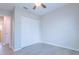 Light and airy bedroom with double door closet and wood-look floors at 121 Coleman Rd, Winter Haven, FL 33880