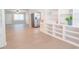 View of living room and kitchen from hallway, open floor plan at 121 Coleman Rd, Winter Haven, FL 33880