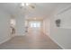 Bright living room with light gray walls and wood-look flooring at 121 Coleman Rd, Winter Haven, FL 33880