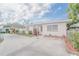 House exterior with carport and landscaping at 121 Coleman Rd, Winter Haven, FL 33880