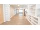 Open concept living and kitchen area with light flooring at 121 Coleman Rd, Winter Haven, FL 33880