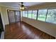 Bright screened porch overlooking a lush green view at 6128 Topher Trl # 6128, Mulberry, FL 33860