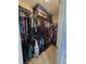 Large walk-in closet with double hanging rods at 1109 Brenton Manor Dr, Winter Haven, FL 33881