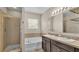 Bathroom with double vanity, shower, and garden tub at 6838 Glenbrook Dr, Lakeland, FL 33811