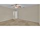 Large bedroom with neutral walls and carpet flooring at 6838 Glenbrook Dr, Lakeland, FL 33811