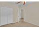 Spacious bedroom with carpet and access to bathroom at 6838 Glenbrook Dr, Lakeland, FL 33811