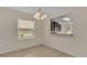 Dining area with tile floors and view into kitchen at 6838 Glenbrook Dr, Lakeland, FL 33811