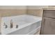 White garden tub with chrome fixtures at 6838 Glenbrook Dr, Lakeland, FL 33811