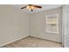 Well-lit bedroom with carpet and ceiling fan at 6838 Glenbrook Dr, Lakeland, FL 33811