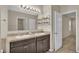 Double vanity bathroom with mirror and shelving at 6838 Glenbrook Dr, Lakeland, FL 33811