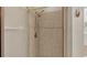 Shower stall with tile surround and handheld shower head at 6838 Glenbrook Dr, Lakeland, FL 33811
