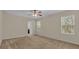 Spacious bedroom with carpet flooring and ceiling fan at 6838 Glenbrook Dr, Lakeland, FL 33811
