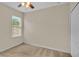 Well-lit bedroom featuring a window and closet at 6838 Glenbrook Dr, Lakeland, FL 33811
