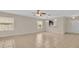 Living room with tile floors and access to back patio at 6838 Glenbrook Dr, Lakeland, FL 33811