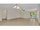 Bright living room with tile floors and access to backyard at 6838 Glenbrook Dr, Lakeland, FL 33811