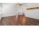 Bright living room featuring hardwood floors and a ceiling fan at 1618 Birchwood Loop, Lakeland, FL 33811