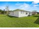 White house exterior with green lawn at 1618 Birchwood Loop, Lakeland, FL 33811