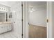 Bedroom with carpet and access to bathroom at 1618 Birchwood Loop, Lakeland, FL 33811
