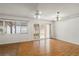 Spacious dining room with laminate wood floors and sliding glass doors at 1618 Birchwood Loop, Lakeland, FL 33811