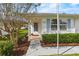 House exterior showcasing walkway, landscaping, and entrance at 1618 Birchwood Loop, Lakeland, FL 33811