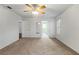 Bright bedroom with ceiling fan and carpet flooring at 1618 Birchwood Loop, Lakeland, FL 33811