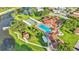 Community clubhouse with pool, tennis courts, and gazebo at 1618 Birchwood Loop, Lakeland, FL 33811