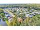 Aerial view of a residential community with lush landscaping at 1618 Birchwood Loop, Lakeland, FL 33811