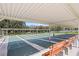 Covered shuffleboard courts with benches at 1618 Birchwood Loop, Lakeland, FL 33811