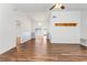 Spacious living room with hardwood floors and ceiling fan at 1618 Birchwood Loop, Lakeland, FL 33811