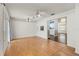 Bright dining room area with hardwood floors and kitchen access at 1618 Birchwood Loop, Lakeland, FL 33811