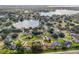 Aerial view showcasing home's location in a lakefront community at 10517 Mesa Ln, Clermont, FL 34711