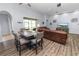 Bright dining area with a wood table and chairs, near the living room at 1781 Ashworth Loop, Lakeland, FL 33810