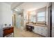 Bathroom with vanity, shower, and tub at 4829 Colonnades E Cir, Lakeland, FL 33811